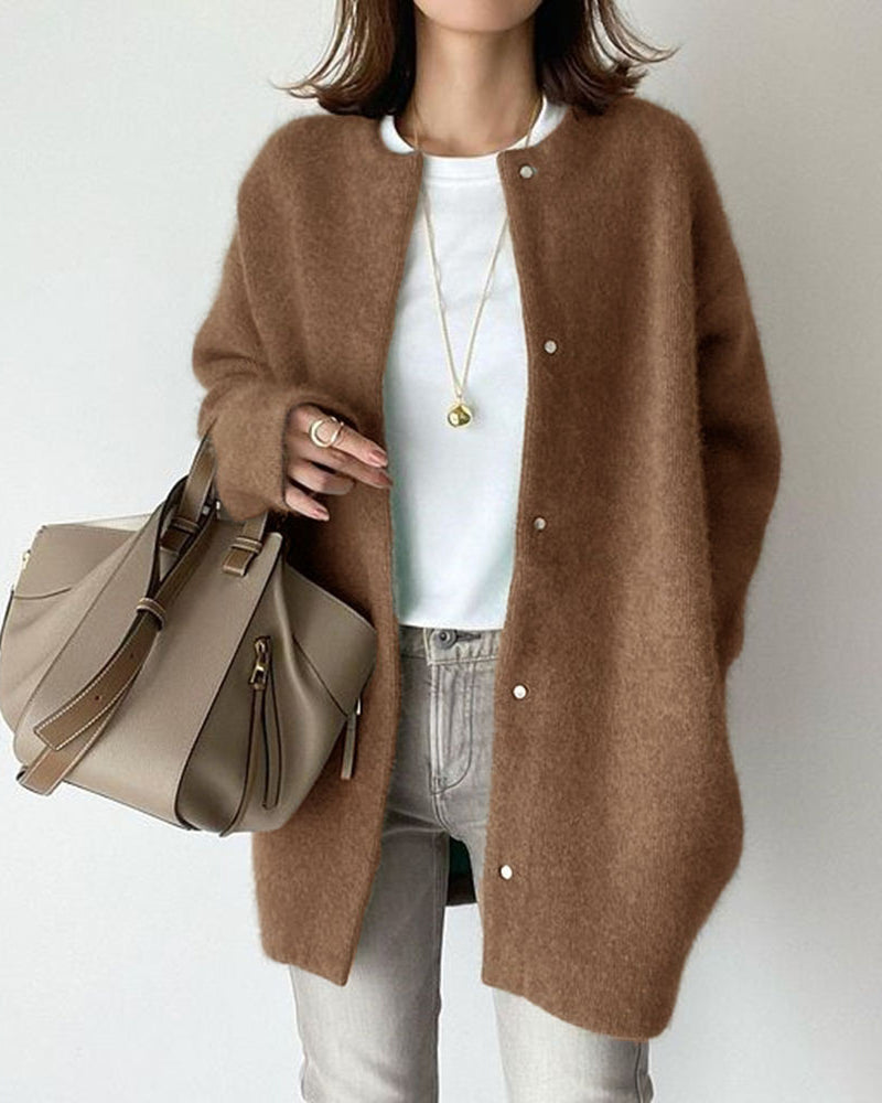 Woman in fuzzy long knit cardigan