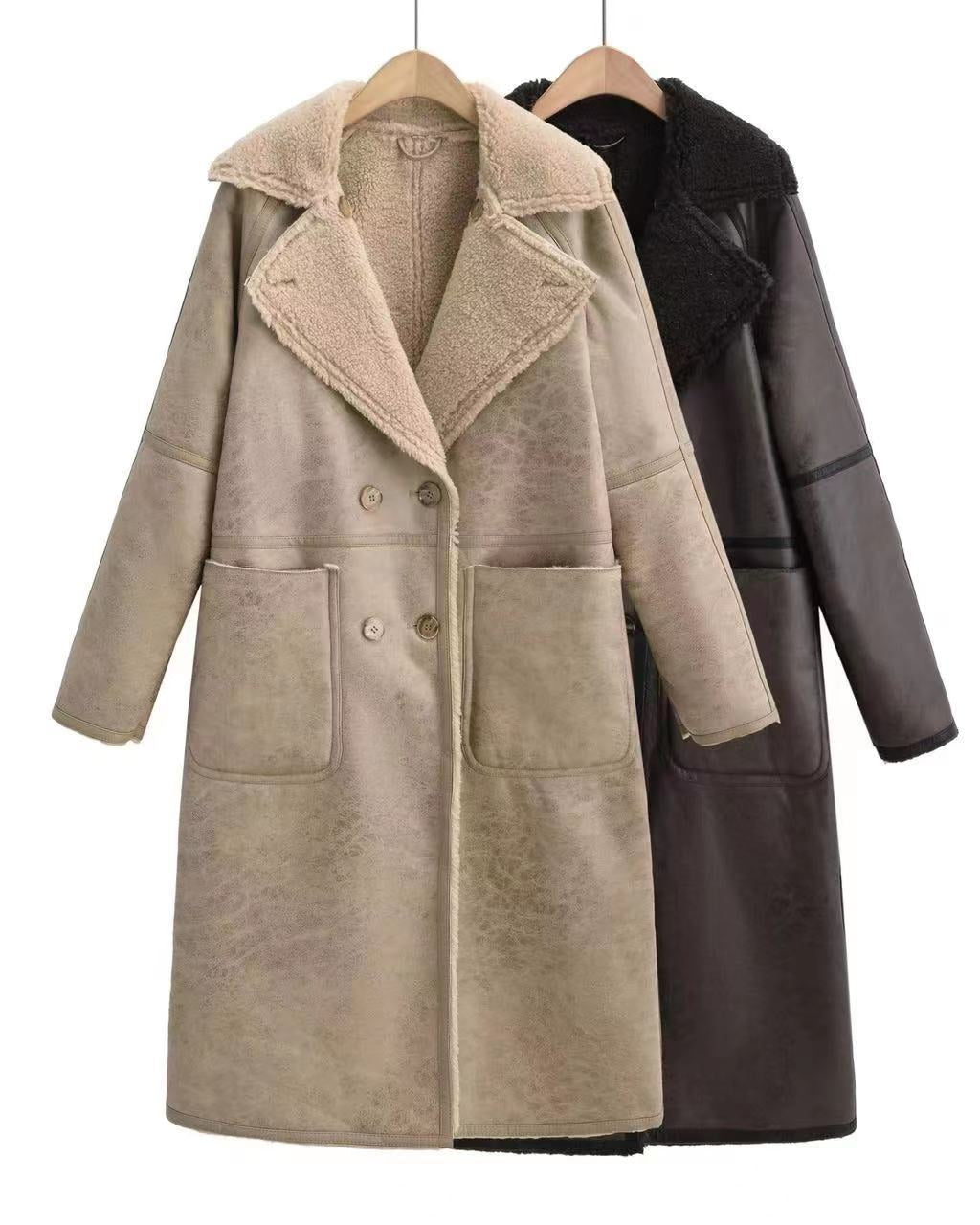Woman in a belted faux shearling coat