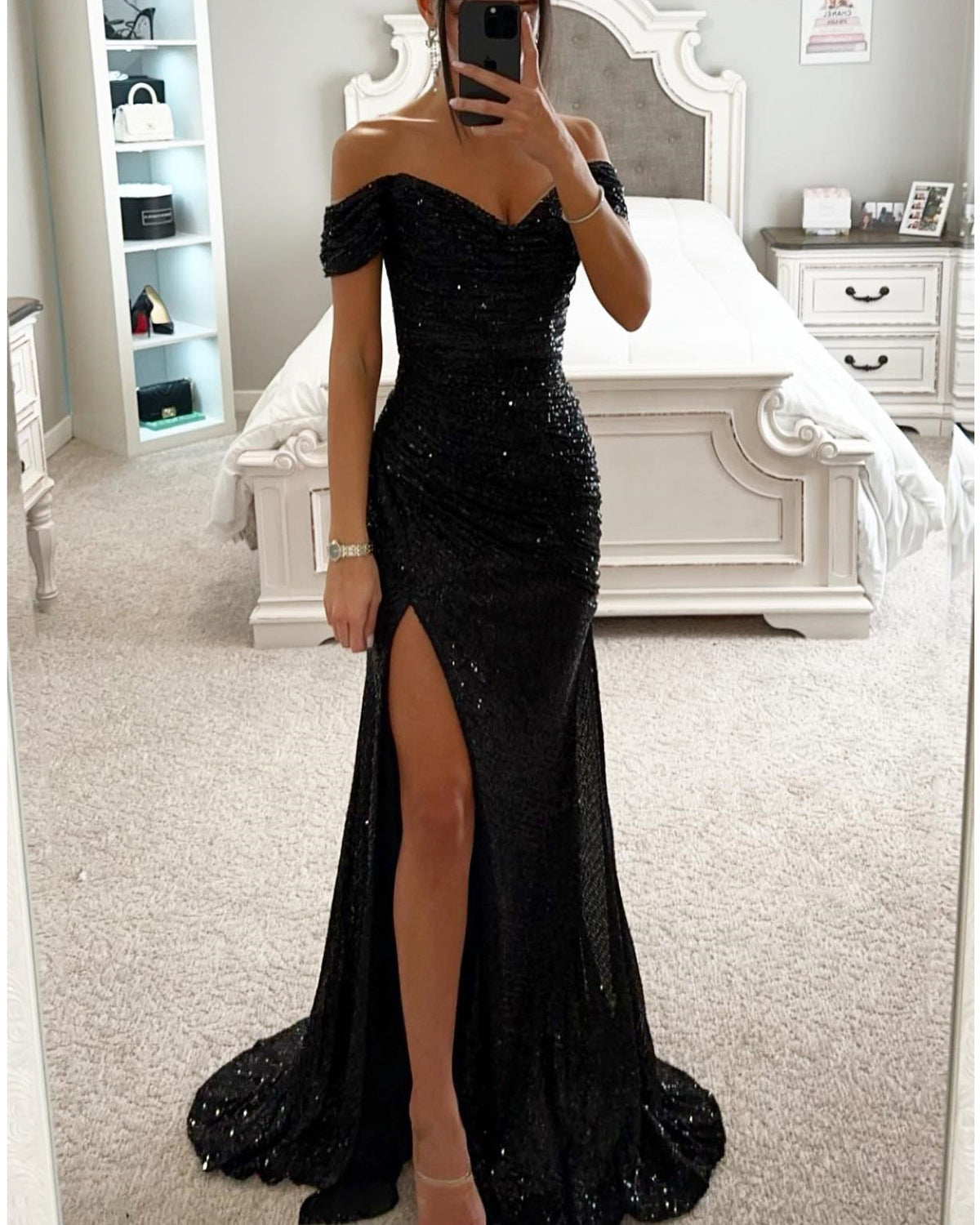 Woman in long off-shoulder sequin evening dress