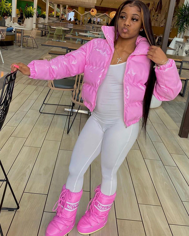 Woman in a glossy cropped puffer jacket