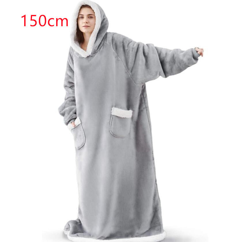 Oversized sherpa hoodie blanket on the couch
