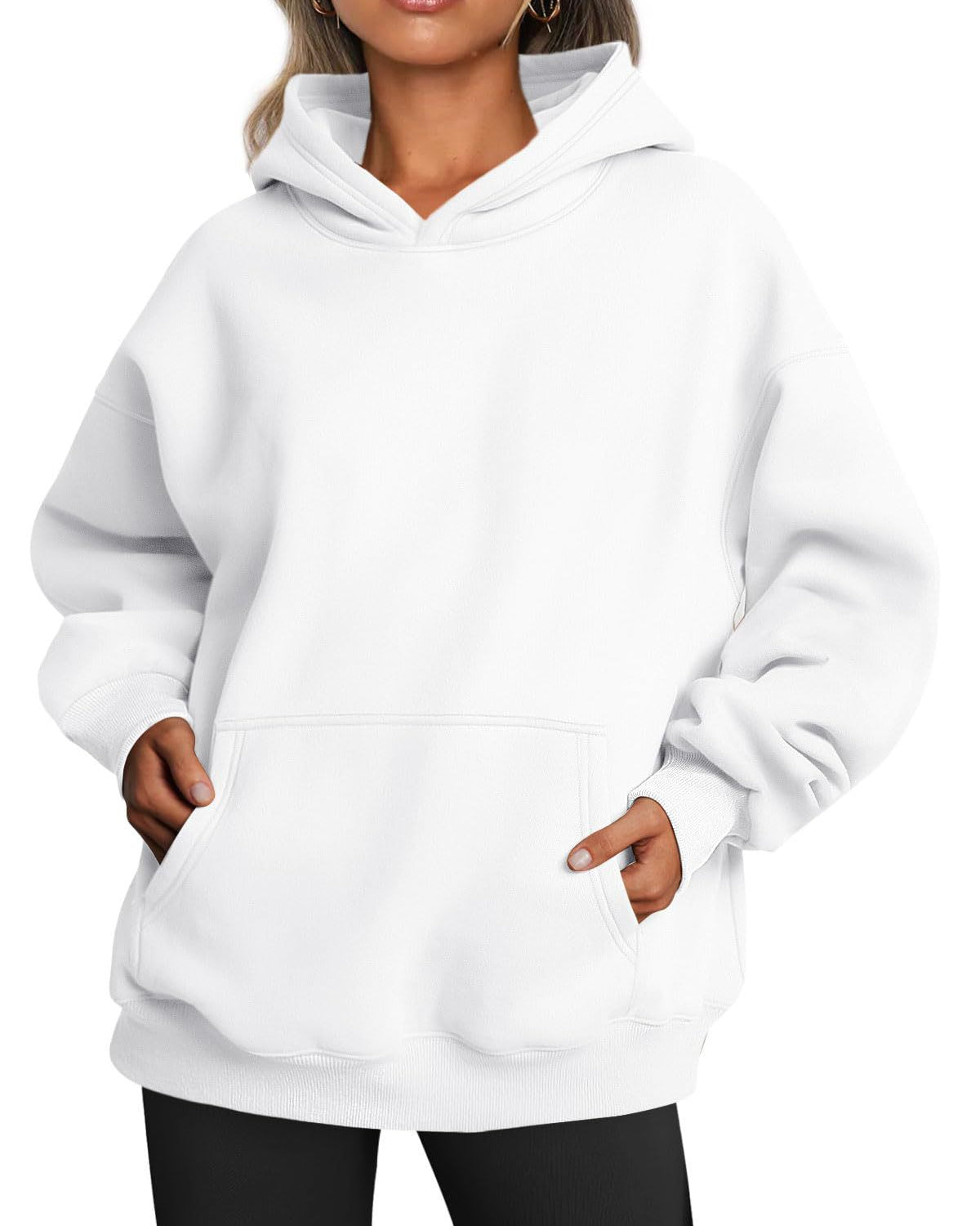 Woman wearing oversized fleece hoodie