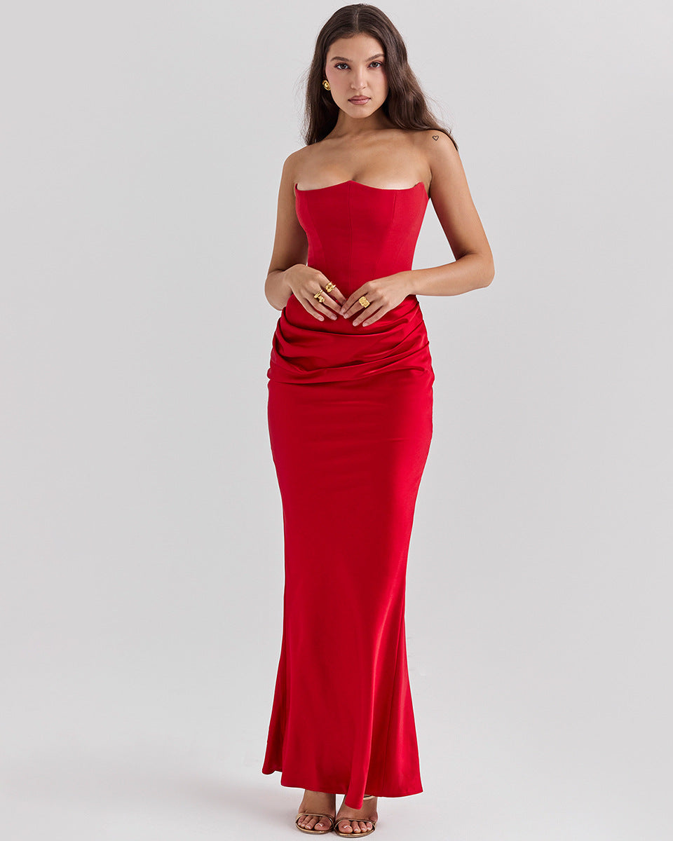 Woman in a strapless satin maxi gown