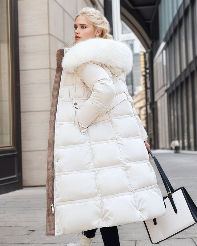 Woman in a long parka with fur hood