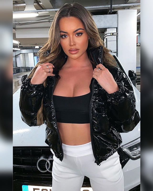 Woman in a glossy cropped puffer jacket