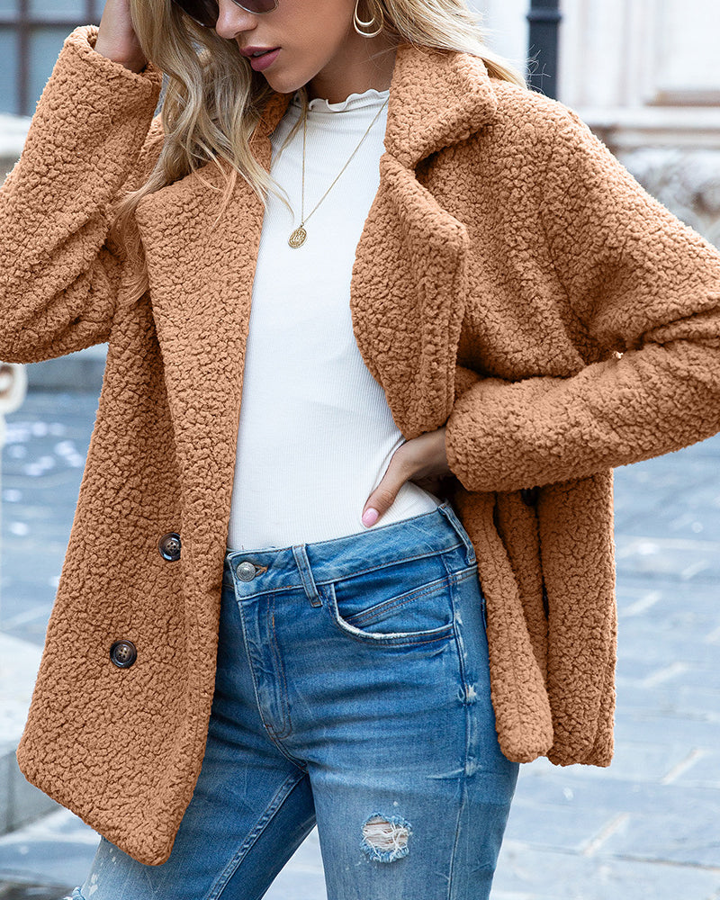 Woman in double-breasted teddy fleece coat