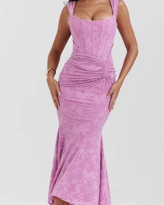 Woman in an off-shoulder mermaid gown