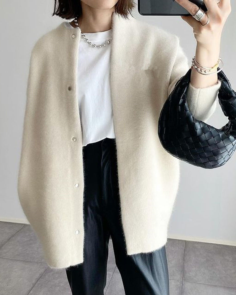 Woman in fuzzy long knit cardigan