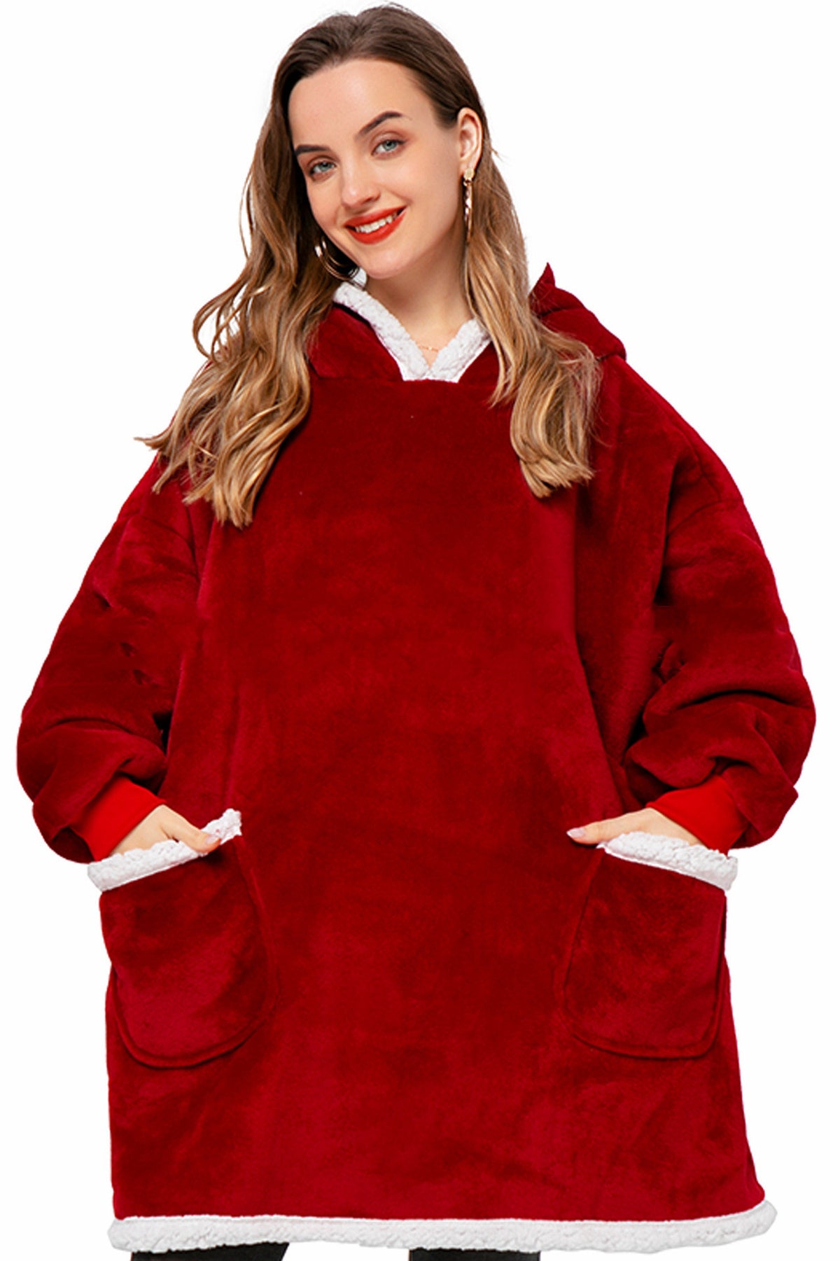 Oversized sherpa hoodie blanket on the couch