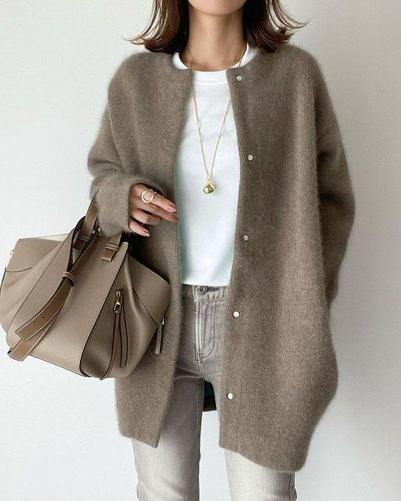 Woman in fuzzy long knit cardigan