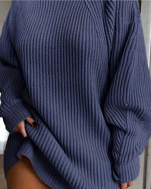 Woman in oversized turtleneck sweater dress
