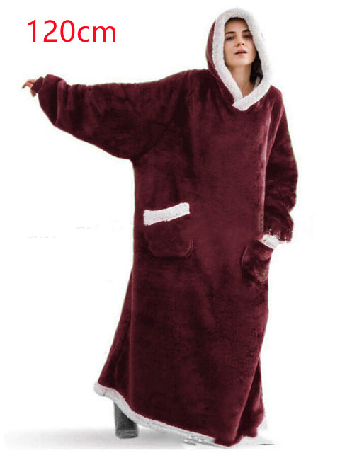 Oversized sherpa hoodie blanket on the couch