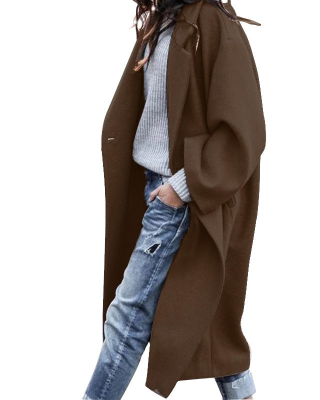 Woman in long oversized lapel coat