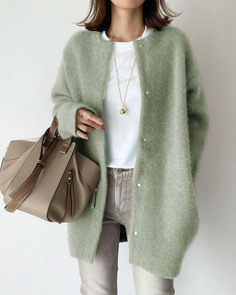 Woman in fuzzy long knit cardigan
