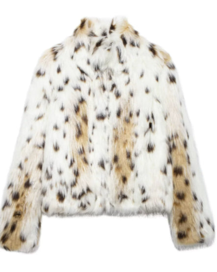 Woman in cropped fluffy faux fur jacket