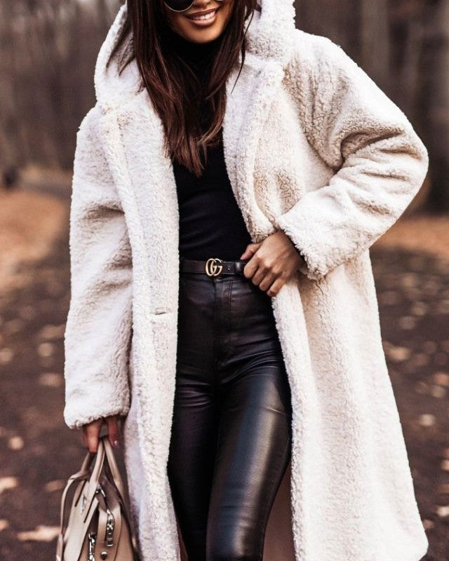Woman in long hooded teddy coat