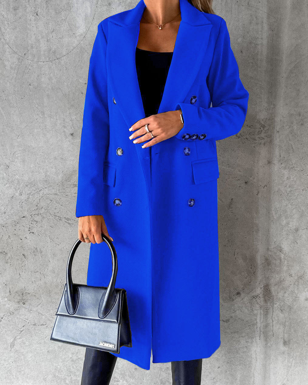 Woman in long double-breasted coat