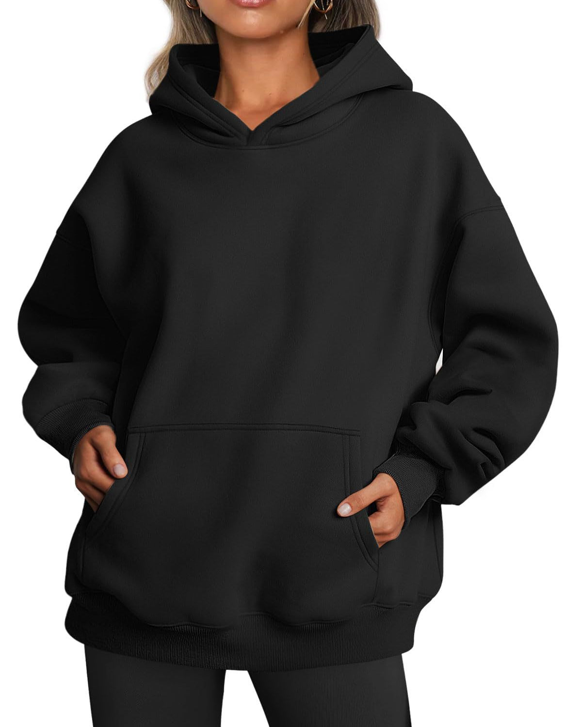 Woman wearing oversized fleece hoodie