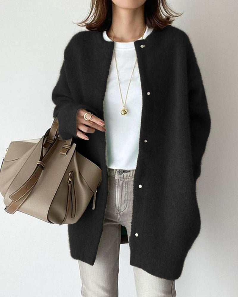 Woman in fuzzy long knit cardigan