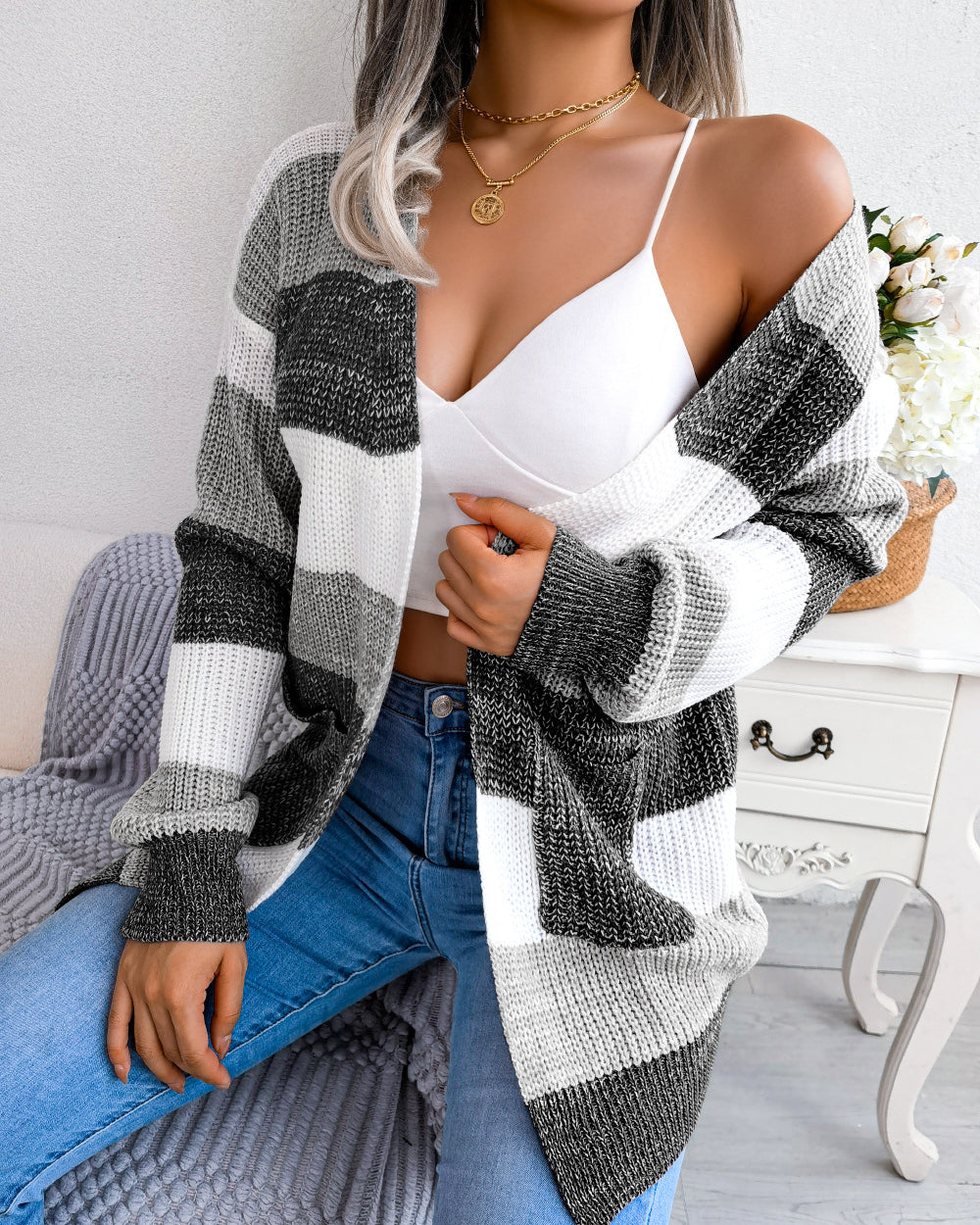 Woman in striped open front cardigan