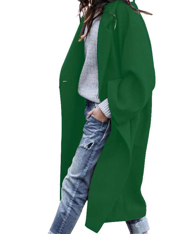 Woman in long oversized lapel coat