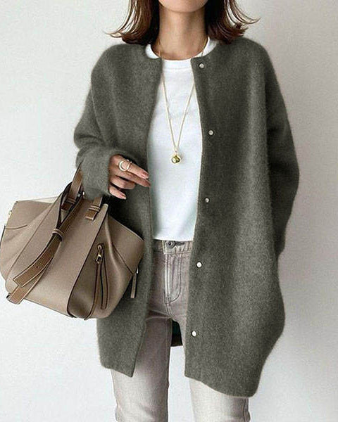 Woman in fuzzy long knit cardigan