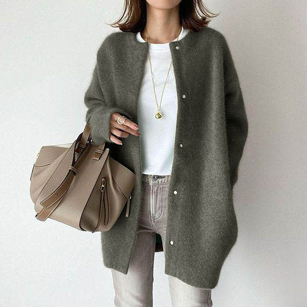 Woman in fuzzy long knit cardigan