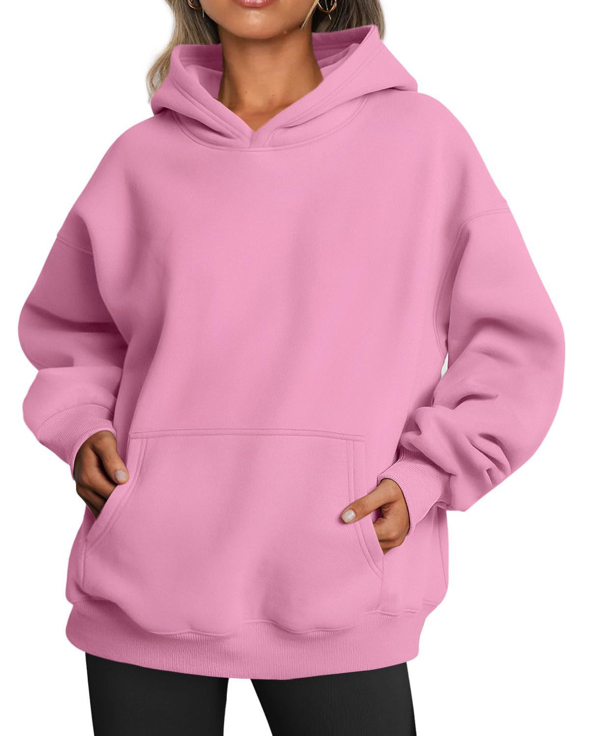 Woman wearing oversized fleece hoodie