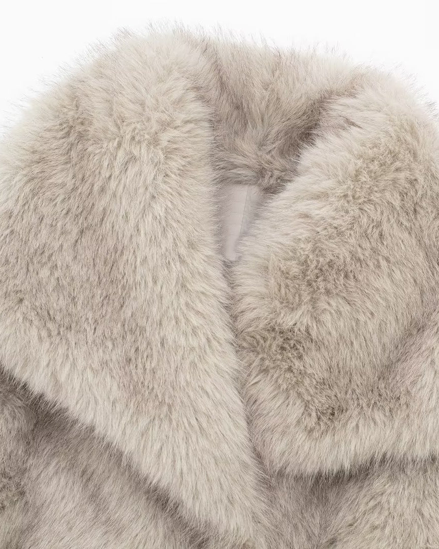 Woman in cropped fluffy faux fur jacket