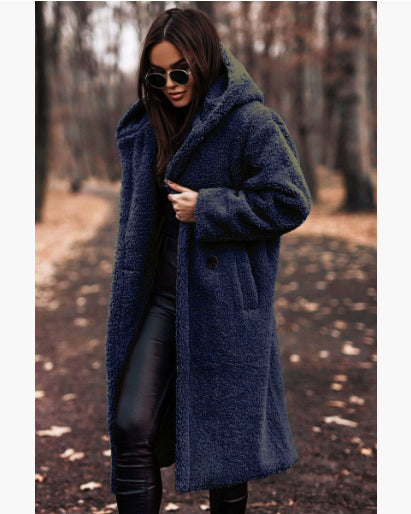 Woman in long hooded teddy coat