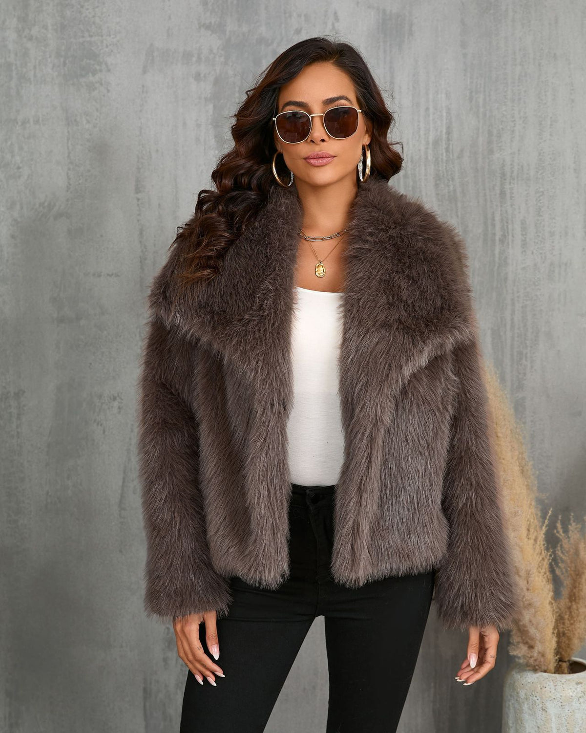 Woman in cropped fluffy faux fur jacket