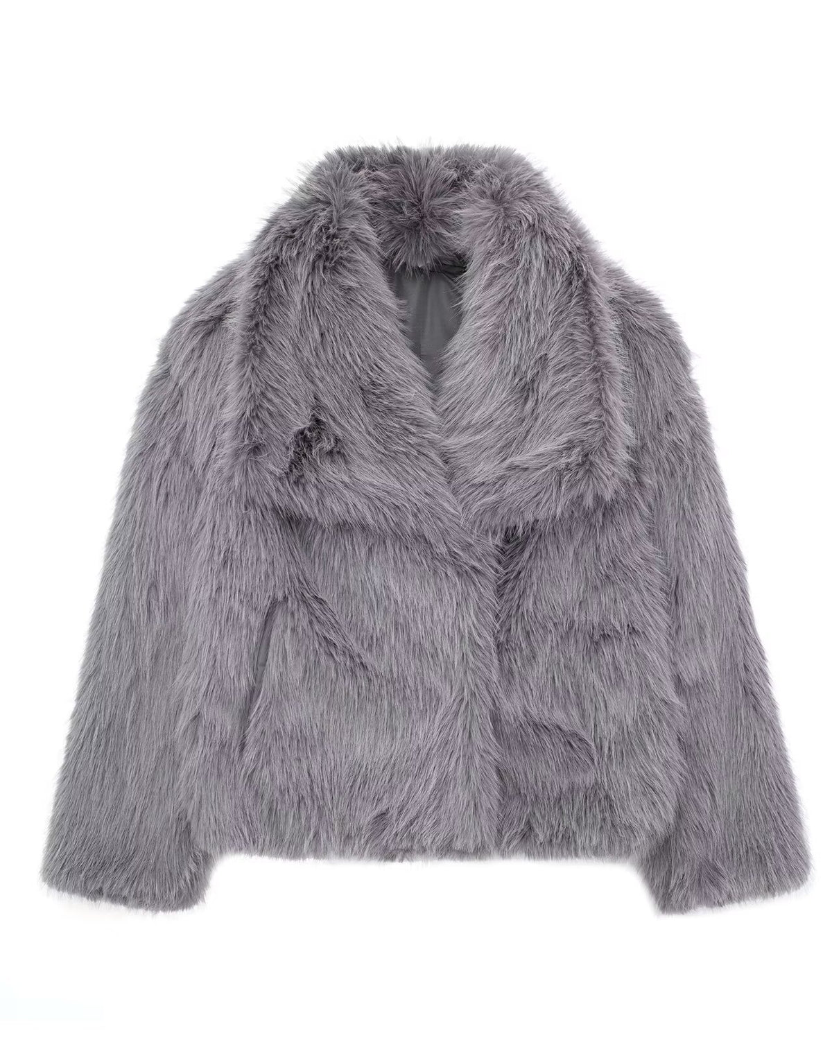 Woman in cropped fluffy faux fur jacket