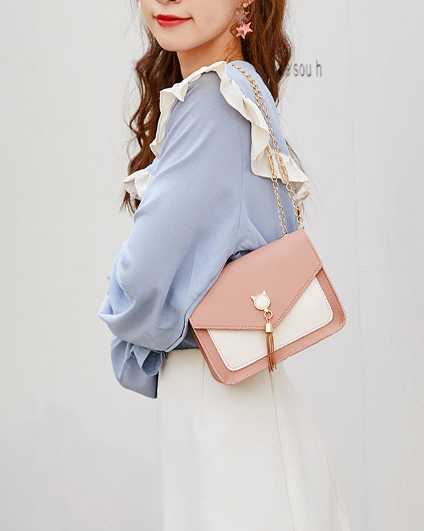 Small square crossbody bag with cat clasp