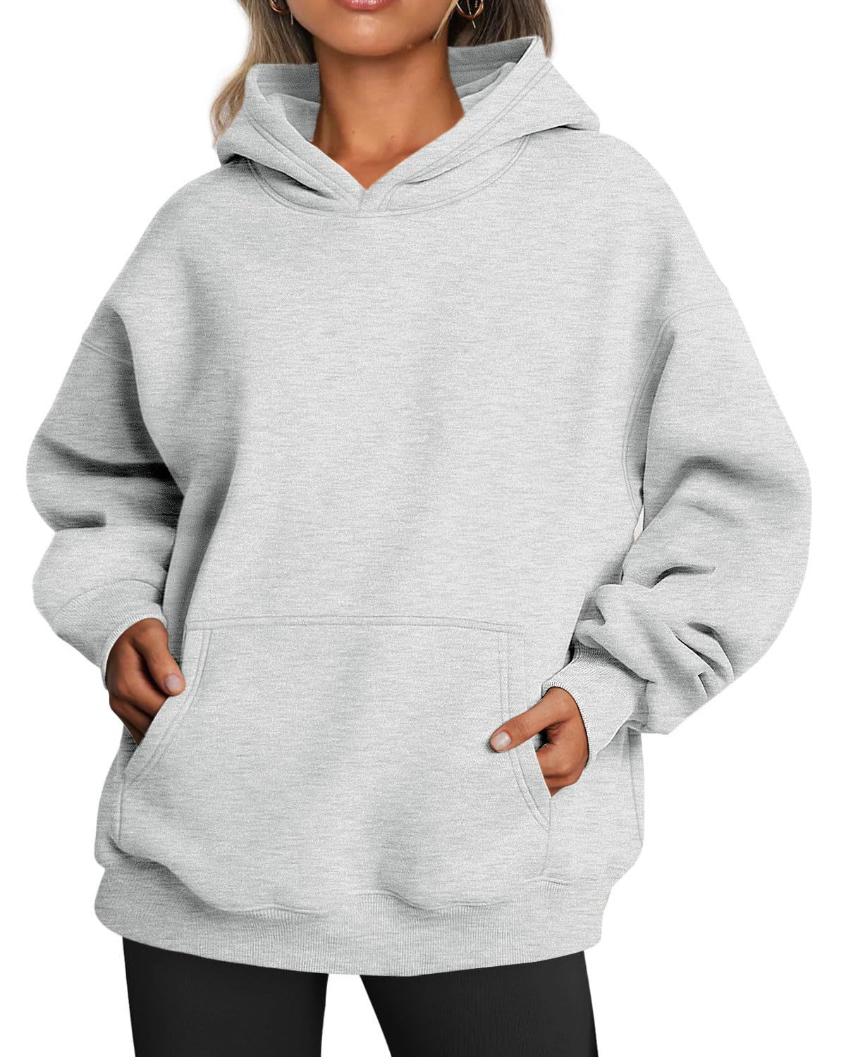 Woman wearing oversized fleece hoodie