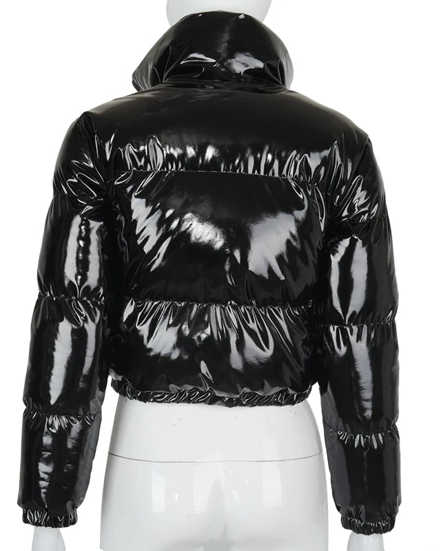 Woman in a glossy cropped puffer jacket