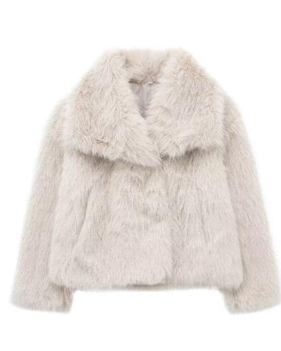 Woman in cropped fluffy faux fur jacket