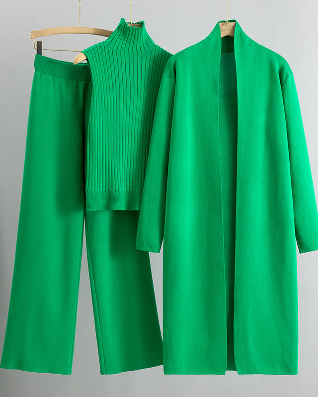 Woman in a matching three-piece knit set