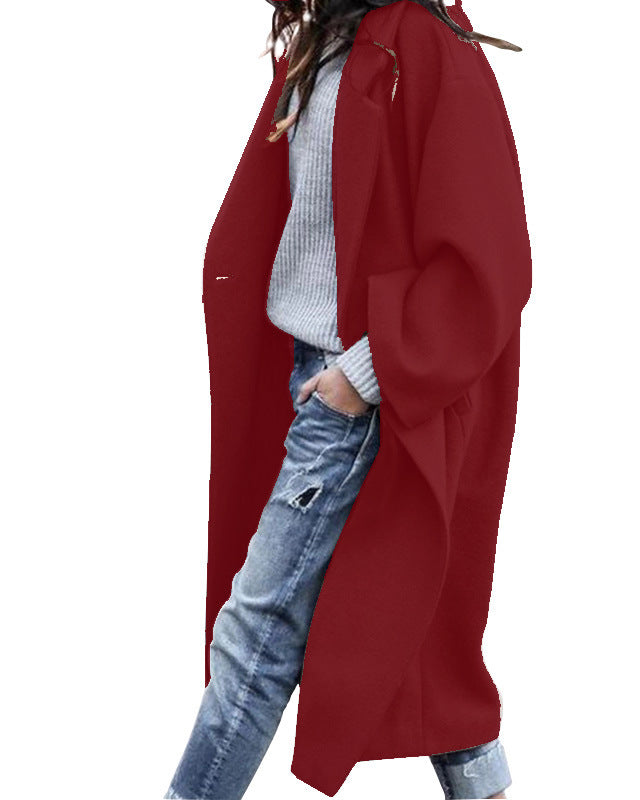 Woman in long oversized lapel coat