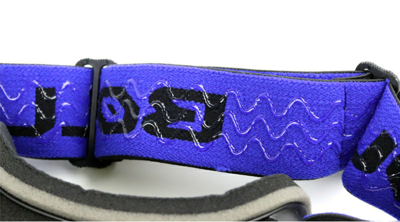 Black frameless ski goggles with blue mirror lens