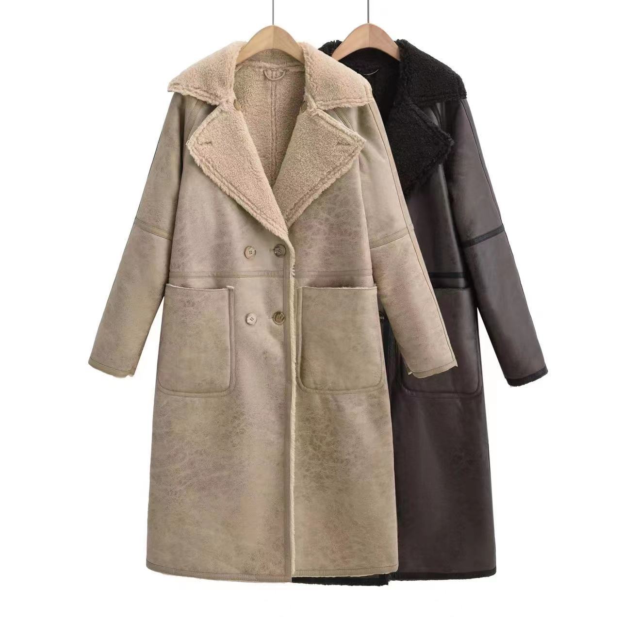 Woman in a belted faux shearling coat