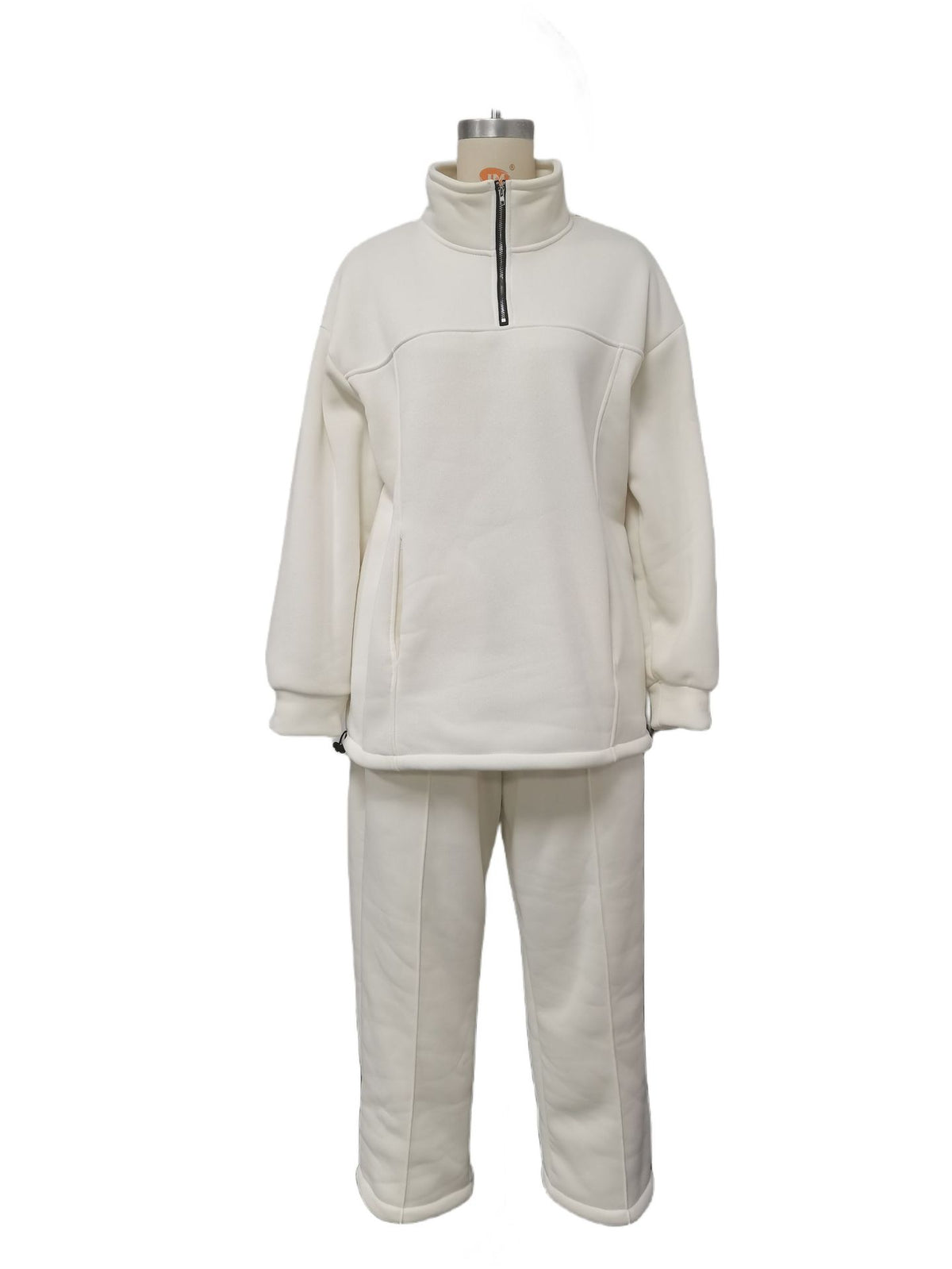 Woman in a half-zip fleece tracksuit