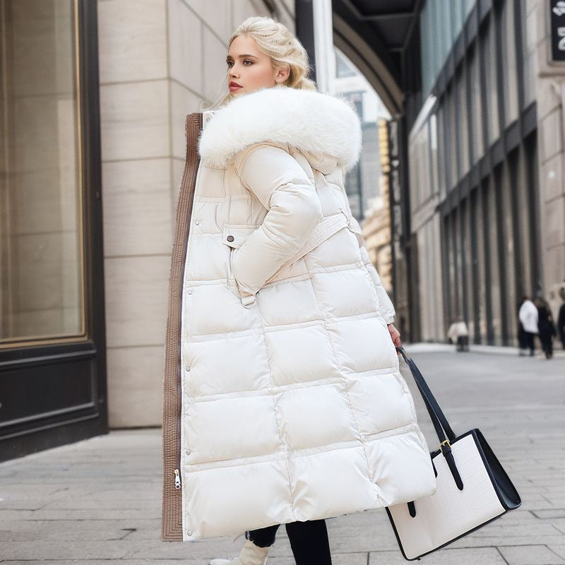 Woman in a long parka with fur hood