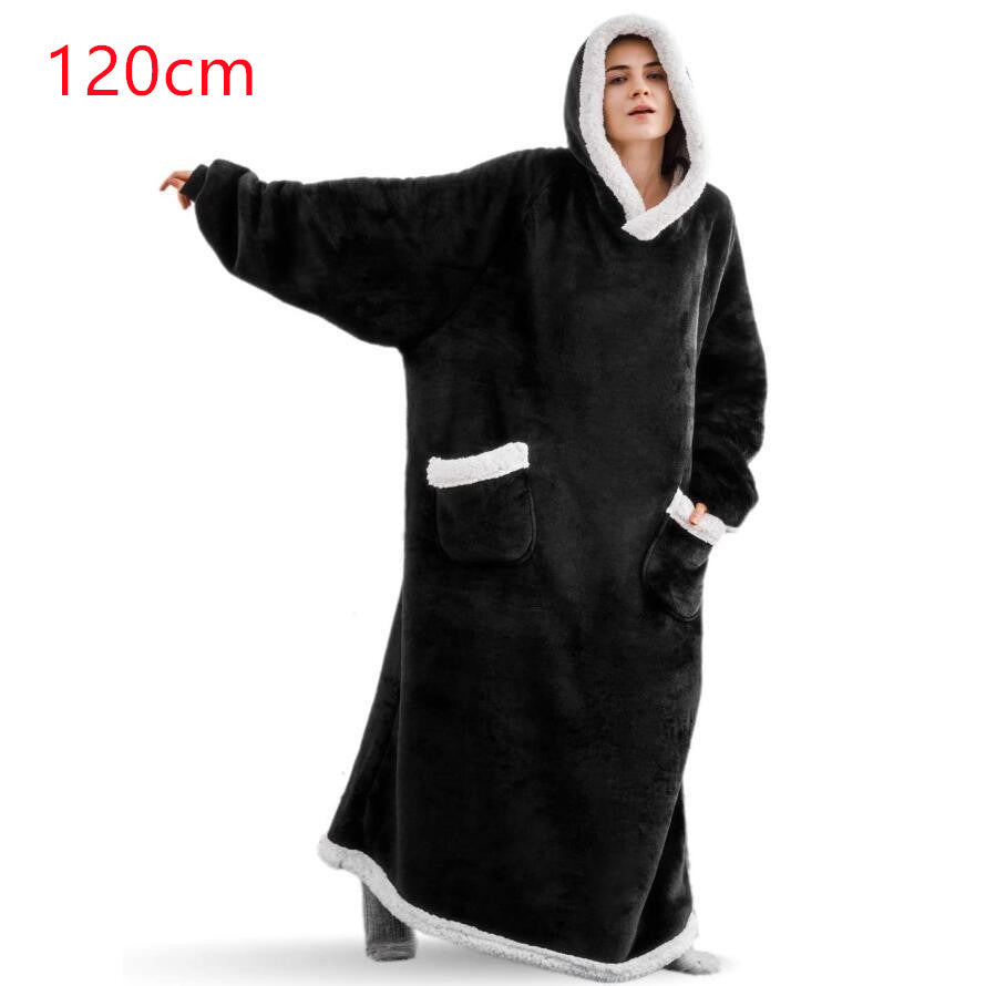 Oversized sherpa hoodie blanket on the couch