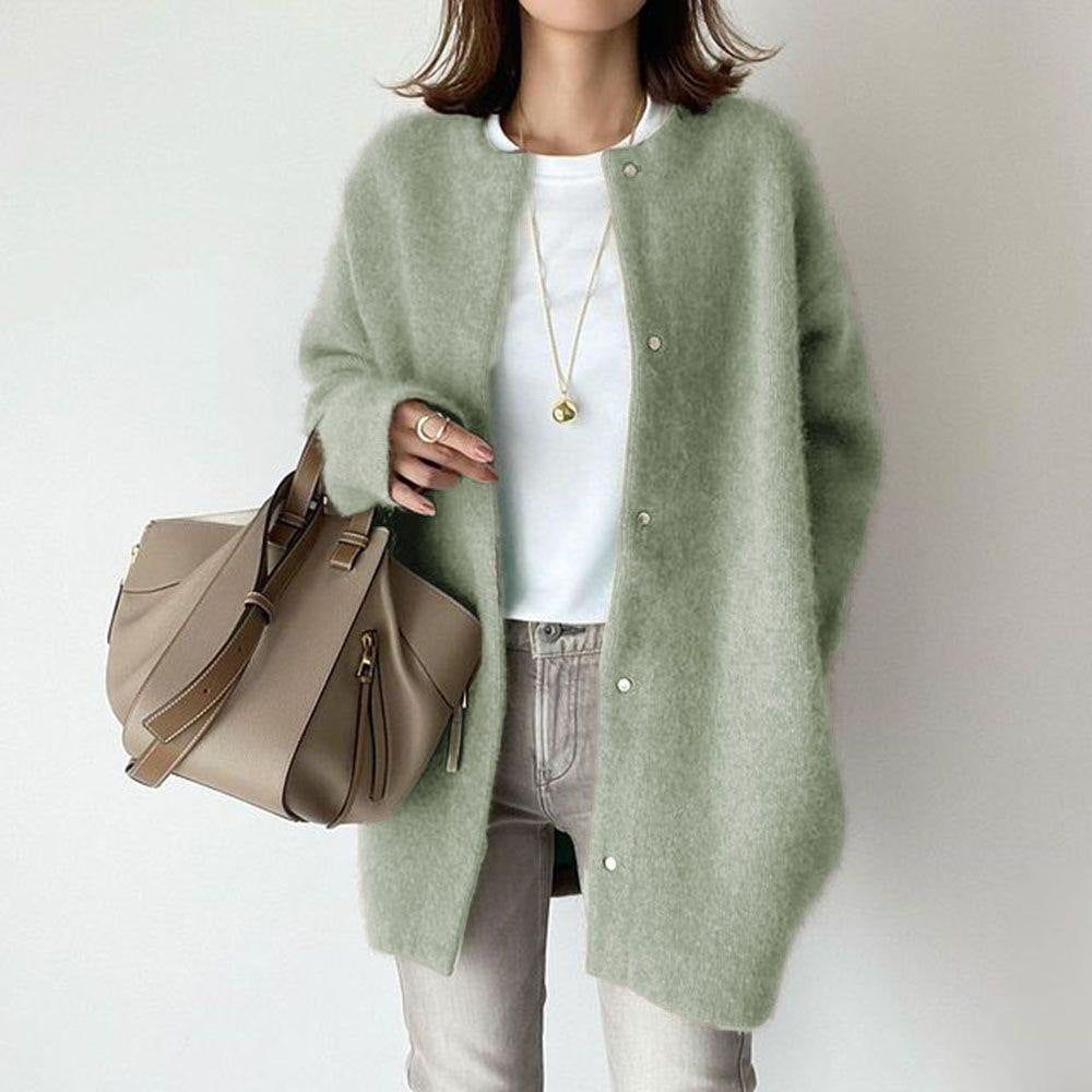 Woman in fuzzy long knit cardigan