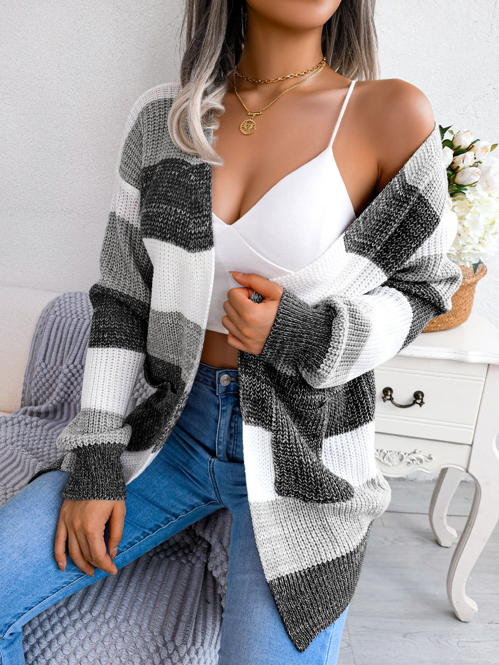 Woman in striped open front cardigan