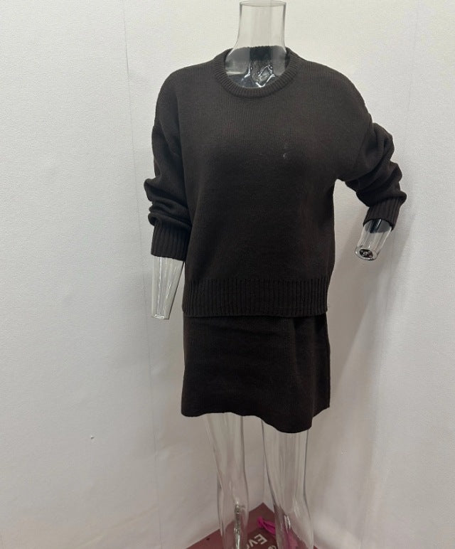 Woman in matching knit sweater and mini skirt set