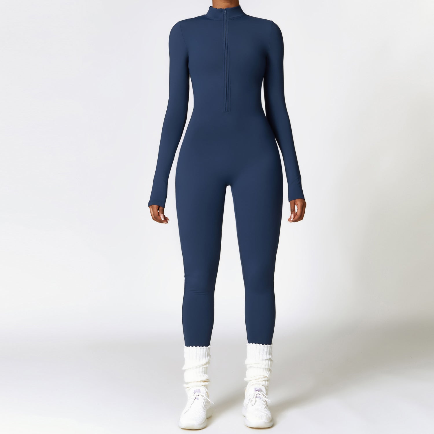 Woman in a zip-front yoga jumpsuit