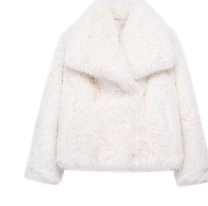 Woman in cropped fluffy faux fur jacket