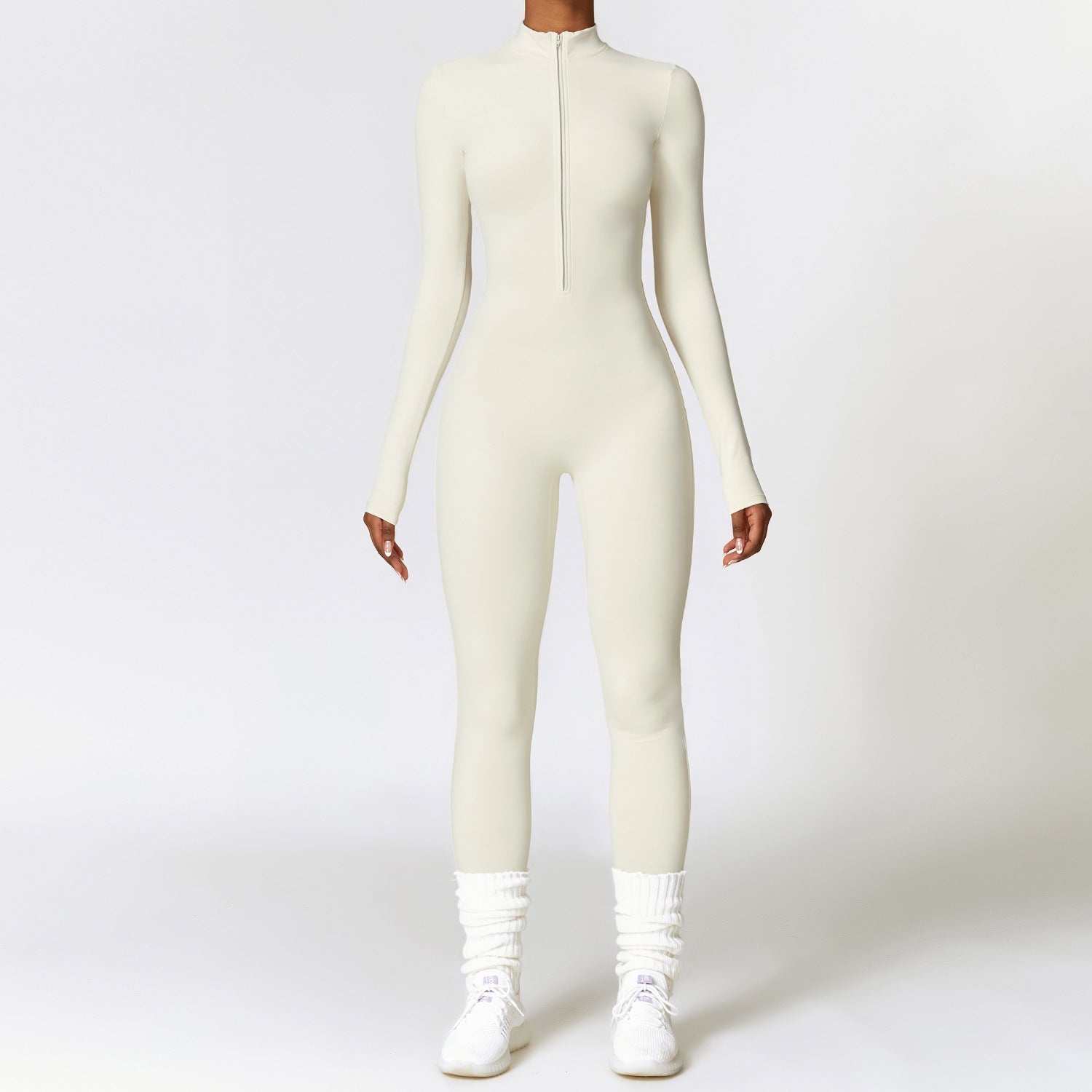 Woman in a zip-front yoga jumpsuit