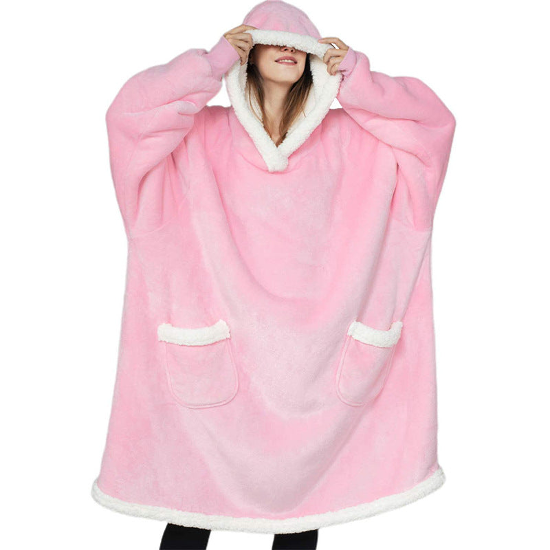 Oversized sherpa hoodie blanket on the couch